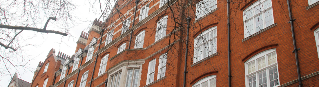 Looking up at an apartment block