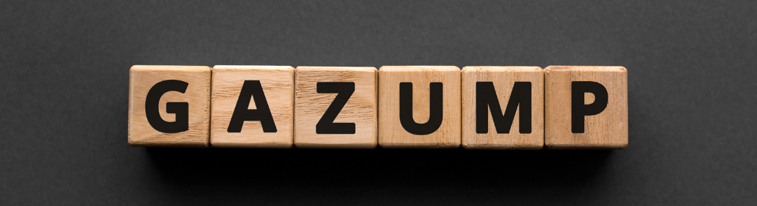 Wooden blocks spelling GAZUMP