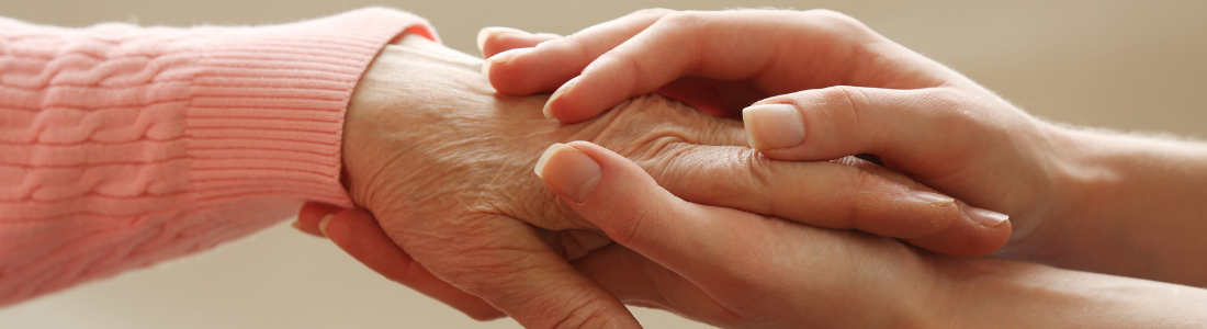 Holding elderly hands